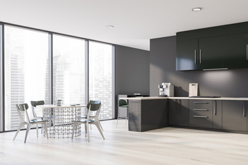 Loft gray and green kitchen corner with table