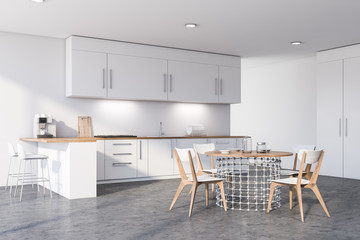 White kitchen corner with table