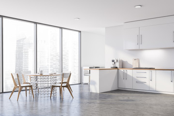 Panoramic white kitchen corner with table