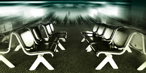 row of black chair at airport