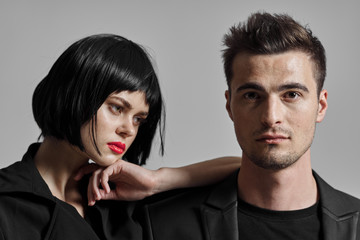 portrait of young man and woman