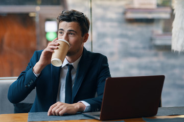 young businessman talking on mobile phone