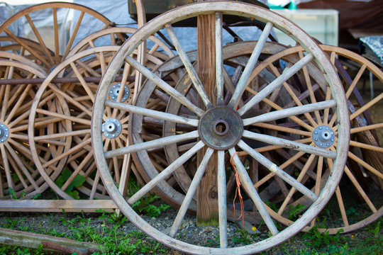 Old antique vintage wood wagon  with retro wheels