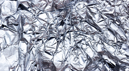 Silver texture background. Shiny silver metal foil texture.