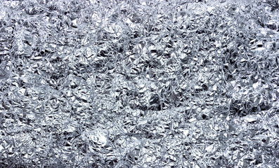 Silver texture background. Shiny silver metal foil texture.