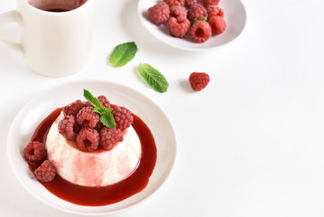 Panna cotta with fresh raspberries
