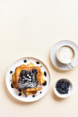 French toasts with blueberry sauce
