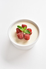 Panna cotta with fresh raspberries