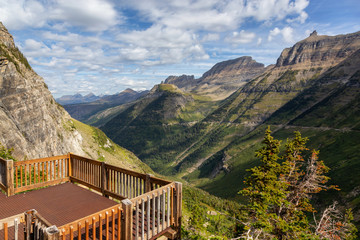 Beautiful Panoramic View of American Rockies from a viewpoint during a sunny summer day. Taken in Glacier National Park, Montana, United States of America.
