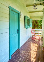 Porch detail of a Country style wooden bungalow.