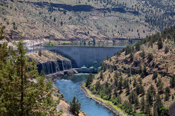 Fototapeta na wymiar View of a Dam during a sunny summer day. Madras, Oregon, United States of America.