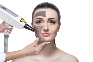A cosmetologist is making carbon face peeling procedure in a beauty salon. Hardware cosmetology...