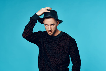 portrait of young man in a hat