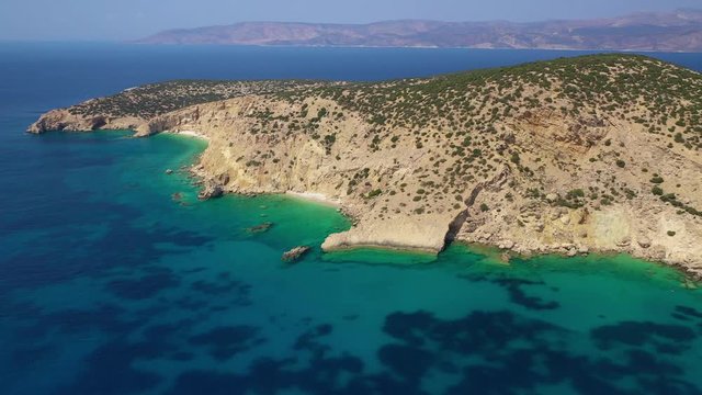 Aerial drone video of Ganoupas and Leonidas paradise beaches with beautiful emerald and turquoise sea and small volcanic bays, Kato Koufonisi, Small Cyclades, Greece
