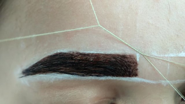 Create permanent eyebrow makeup. Create permanent eyebrow makeup. Thread depilation.