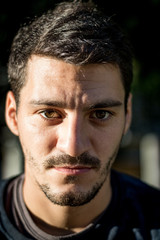 Fototapeta premium A young men in the park in Paris