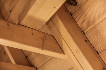 Wooden joints in ceilings in a modern wooden hut.