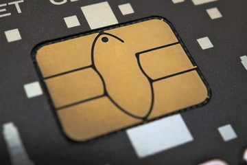 Plastic card chip close-up. Bank card in black