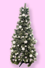 Christmas tree isolated on pink