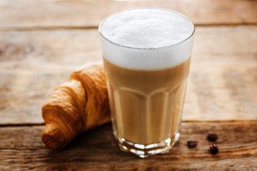 Coffee drink with fresh croissants