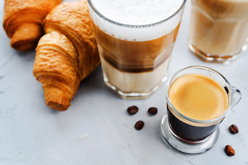 Coffee drink with fresh croissants
