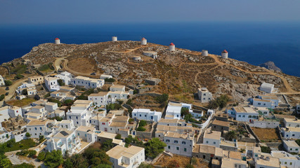 Fototapeta na wymiar Aerial drone panoramic photo of picturesque main village or chora and castle of Amorgos island built on top of cliff overlooking the Aegean blue sea, Cyclades, Greece