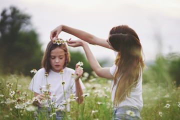 mother and daughter having fun in the park