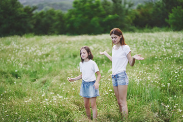 Fototapeta premium mother and daughter in the park