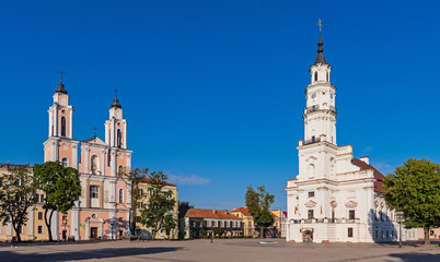 Kaunas - Jesuit church of St. Francis Xavier and the White Swan Town Hall in the center of Kaunas...