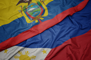 waving colorful flag of philippines and national flag of ecuador