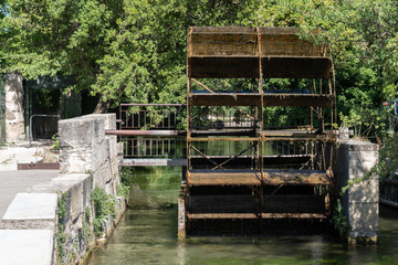 water mill wheel in Isle sur la Sorgue village in Provence France