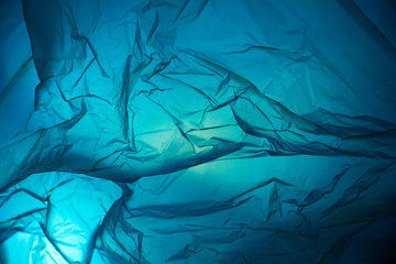 Big blue plastic sack looks like a beneath the blue ocean