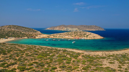 Aerial drone photo of paradise beach of Kalotaritissa with emerald clear sea, Amorgos island,...