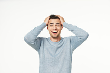 Naklejka premium portrait of a man with hands on his head