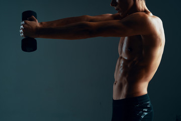 muscular man lifting weights