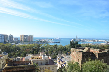 Old town, new town and harbor viewed from above in Malaga Spain