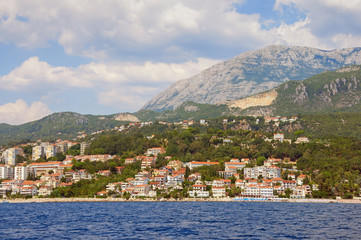 Fototapeta premium Beautiful Mediterranean landscape. Montenegro, Adriatic Sea. View of coastal town of Herceg Novi located at the foot of Mount Orjen