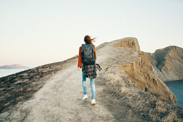 hiker on the top of mountain