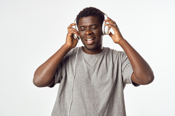Fototapeta premium young man with headphones listening to music