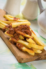 French fries with minced meat salsa