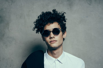 portrait of young man in sunglasses