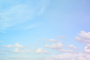 Fototapeta premium Subtle pastel background of clouds in blue sky 
