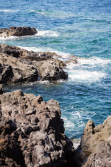 Fototapeta na wymiar Basalt in the ocean in Lanzarote - Lanzarote, Spain