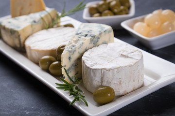 Aged cheese round and slices