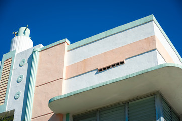 Bright scenic detail view of colorful curving Art Deco architecture in South Beach, Miami, Florida,...