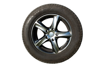 Obraz premium Car tire on an aluminum rim in silver color, isolated on a white background with a clipping path.