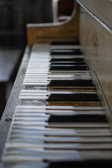 Old piano with missing keys