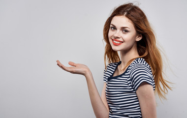 young woman pointing at copyspace