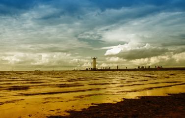 lighthouse at sunset, baltic sea in Poland