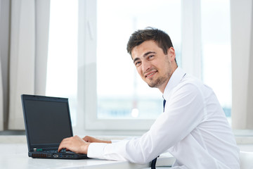 businessman working on laptop in office